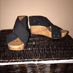 Woman black wedges.